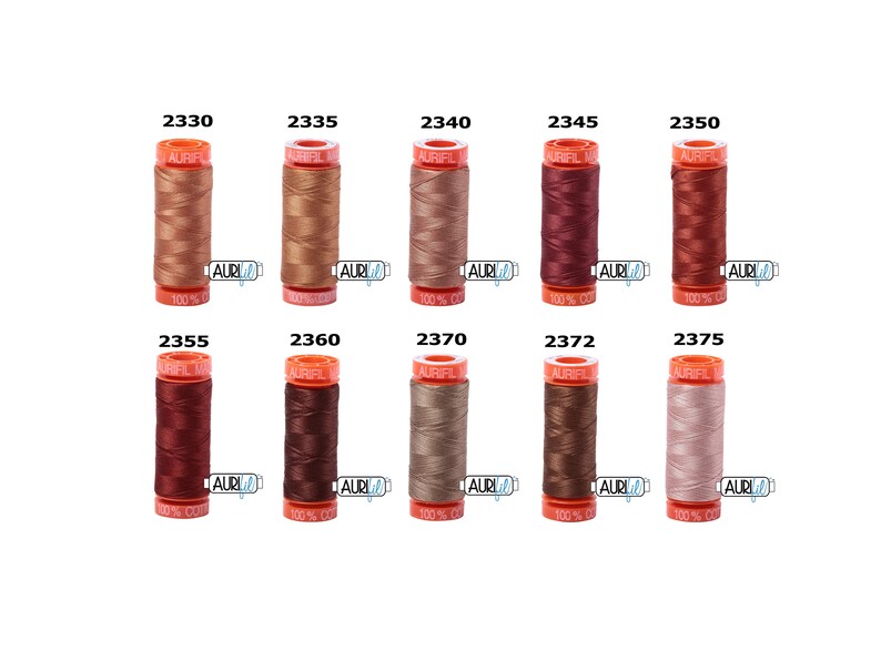 May include: A set of ten spools of Aurifil thread in various shades of brown, beige, and red. Each spool is labelled with the Aurifil logo and the thread number.