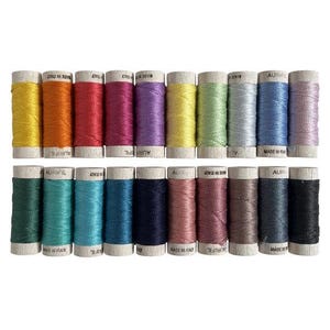May include: Twenty spools of thread in various colors, including yellow, orange, red, pink, purple, green, blue, and brown. The spools are labeled "Aurifil" and "Made in Italy".