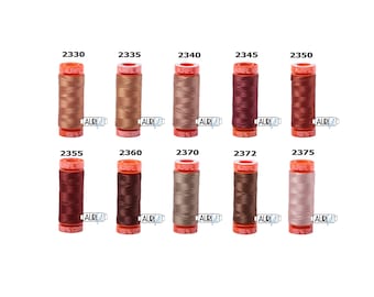 May include: Ten spools of Aurifil thread in various shades of brown, red, and beige. Each spool is labeled with the Aurifil logo and the thread number.