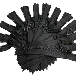 May include: A bulk pack of 20 black zipper pulls. The zippers are 3 inches long and have a black metal slider.