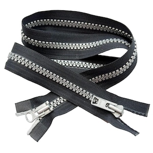 May include: A black separating zipper featuring large, metallic silver-toned teeth and two metal sliders. The zipper tape is made of a woven black fabric, and the metal pull tabs are clearly embossed with the YKK brand logo on the front surface.