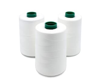 May include: Three spools of white thread with green plastic tops.