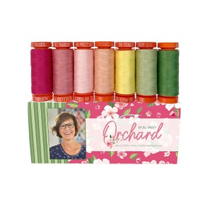 May include: A set of seven small spools of 100% cotton thread in shades of pink, yellow, and green. The spools are labeled "Orchard" by Jill Finley.