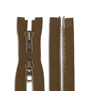May include: A brown zipper with a brass slider and pull. The zipper is open and the teeth are visible.