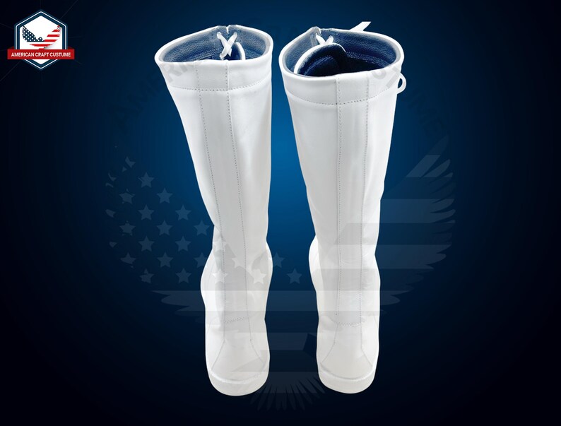 May include: A pair of white knee-high boots with a lace-up front and a blue lining. The boots are made of a smooth, leather-like material.