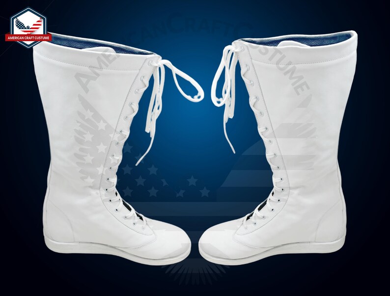May include: A pair of white wrestling boots with blue lining and laces. The boots are tall and have a lace-up design.