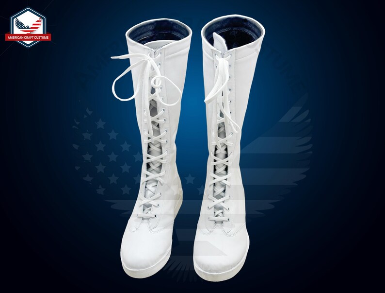 May include: A pair of white leather knee-high boots with lace-up fronts. The boots have a blue lining and are on a blue background.