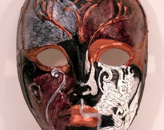 Striking hand painted mask perfect for Mardi Gras, New Years, Halloween or any masquerade occassion