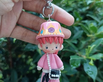 Llavero de arcilla inspirado en el K-Pop: abalorio hecho a mano con acabado de resina UV.