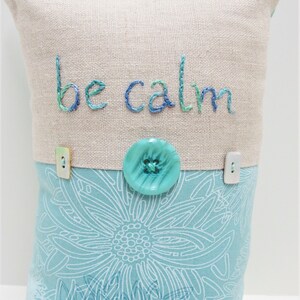 Hand-Embroidered Linen Pillow: &quot;Be Calm&quot; Turquoise Floral Print