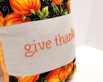Thanksgiving pillow- hand-embroidered "give thanks" pillow in black with bright pumpkins and vines