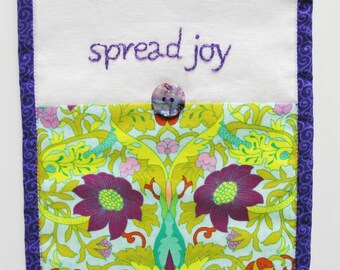 hand embroidered mini wall hanging- purple floss on white linen with floral print "spread joy" inspiration, turquoise, aqua, green, pink