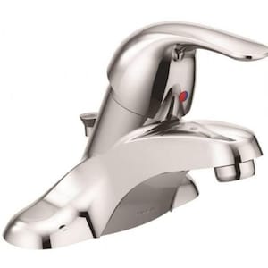 May include: A shiny chrome bathroom faucet with a single lever handle. The faucet has a curved spout and a small red and blue indicator for hot and cold water. The design is modern and sleek.