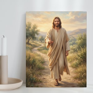 May include: A rectangular canvas print depicting a figure with long brown hair and a beard, wearing a beige robe, walking along a dirt path in a grassy landscape. The figure has one hand extended forward. The scene is set under a soft, golden sky.