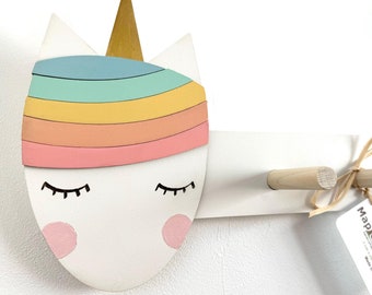 Handcrafted Unicorn Wall Hanger for Kids, Pastel Rainbow Wooden Coat Rack for a Mystical theme with four sturdy pegs.