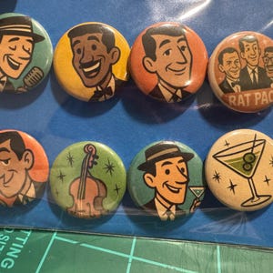 May include: Set of eight vintage-style pinback buttons featuring illustrations of singers, musicians, and a martini glass. The buttons have a retro aesthetic with a color palette of orange, green, yellow, and beige.