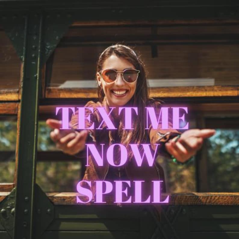 May include: A woman wearing sunglasses and a brown jacket with the text "TEXT ME NOW SPELL" on a wooden surface.
