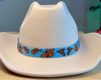 Loomed Seed Bead Orange Monarch Butterflies in Flight Hatband with a Matte Light Blue Background