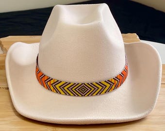 Loomed Seed Bead Starburst Hatband with A Yellow, Orange, Red and Blue Color Fading Background