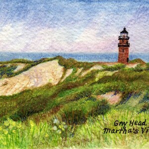 May include: A watercolor painting of a red brick lighthouse on a grassy hill overlooking the ocean. The text "Gay Head Lt. Martha's Vineyard" is written in black ink at the bottom of the painting.