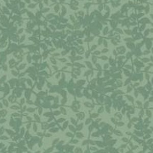 Puede incluir: Una tela verde con un patrón repetitivo de hojas y ramas.