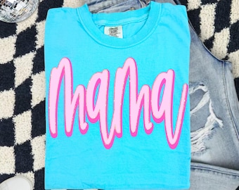 PNG com glitter dourado "Mamãe", desenho à mão com letras cursivas, glitter dourado, PNG com design cursivo "Mamãe", PNG com estilo preppy, sublimação moderna, design para artesanato em PNG.