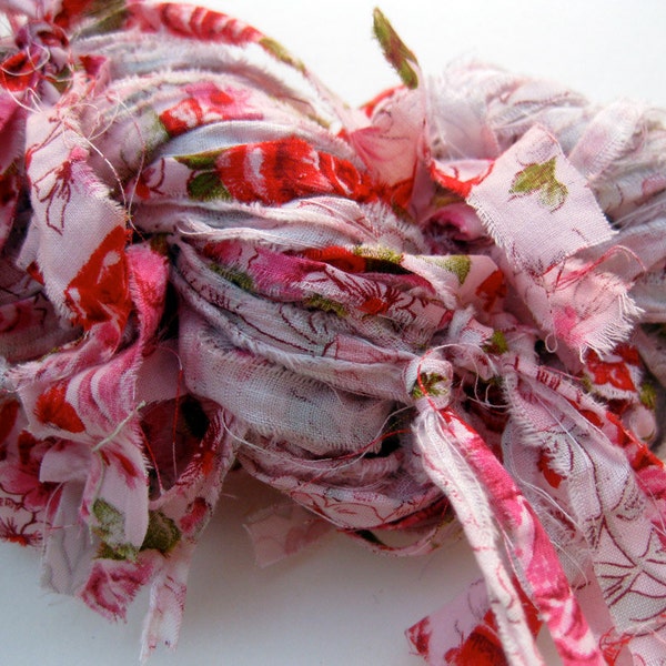 Fine pink flower fabric ribbon, knotted