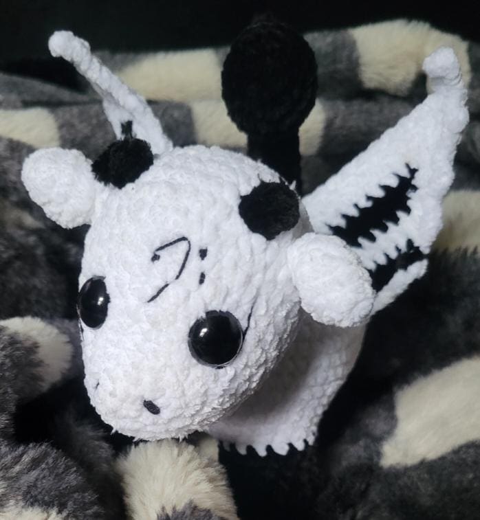 30 Adorable Cow Plush Crochet Patterns for Farmhouse Decor, Gifts, and Cozy Displays 16 Moosical Flying Cow Crochet Pattern