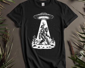 Bigfoot Abduction Shirt | Alien UFO Tee | Funny Cryptid Shirt | Paranormal Desert Scene | Weirdcore Graphic Tee | Soft Unisex T-Shirt