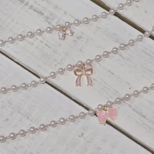 Gold link with pearls and center charm trucker hat chain