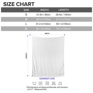 May include: A white blanket with a size chart. The chart shows sizes S, M, L, and XL, with corresponding widths and lengths in inches and centimeters. The blanket's dimensions are provided, with the XL size measuring 59.1 inches wide and 78.7 inches long.