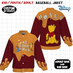 May include: A baseball jacket in maroon and gold, featuring Winnie the Pooh characters. The jacket has a "HONEY" design on the back and the text "Winnie the Pooh" on the front. The jacket is available in adult and kid sizes.