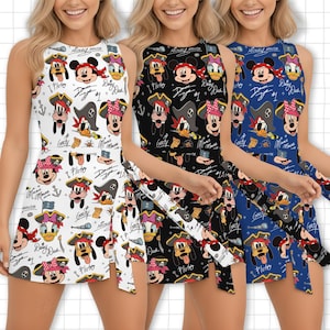 May include: Three sleeveless dresses with a pirate-themed Mickey Mouse and friends pattern. The dresses are white, black, and blue, featuring cartoon characters, anchors, and the text "Mickey Mouse". Each dress has a matching tie.