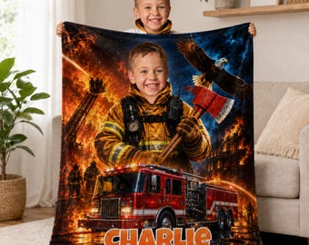 May include: A rectangular fleece blanket featuring a vibrant graphic print of a child dressed in tan firefighter gear holding a red axe. The design includes a red fire truck, flames, and a bald eagle. The name Charlie is printed in orange letters.