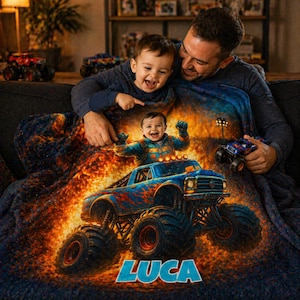 May include: A soft plush blanket featuring a vibrant graphic of a child driving a blue monster truck amidst orange flames and sparks. The design includes the name LUCA in bold blue letters at the bottom, set against a dark, textured background.