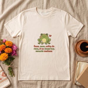 Sana Sana Colita de Rana Shirt, Bandaged Frog with Heart, Spanish Saying Tee, Unisex