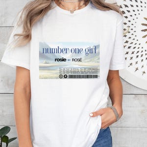 Number One Girl by singer Rosé. Graphic Unisex T-Shirt. Rosie Music Album, Rosie Songs, Music and Lyrics, Rosé Inspired Tees, Pop Music List