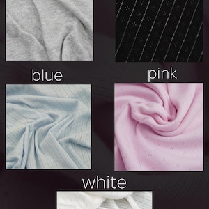 May include: A collection of fabric swatches in grey, black, blue, pink, and white. Each swatch displays a different color and texture. The word for each color is written above the swatch.