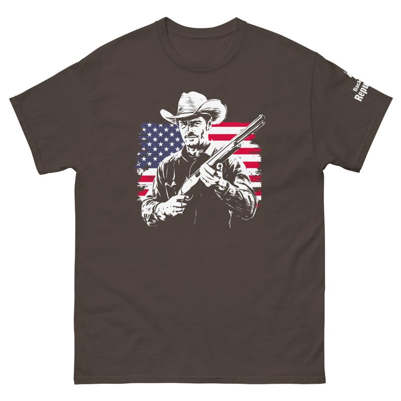 Patriotic Cowboy Marksman Shirt Chocolate | USA Flag Graphic Tee Chocolate | American Pride Shirt Chocolate | Hunting Trip Tee Chocolate | Cool Dad Tee Chocolate | American Flag Shirt Chocolate