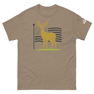 Patriotic Deer Tee Brown | USA Flag Deer Graphic Tee Brown | Deer with Flag Shirt Brown | Deer Season Shirt Brown | American Pride Shirt Brown | Hunting Trip Tee Brown