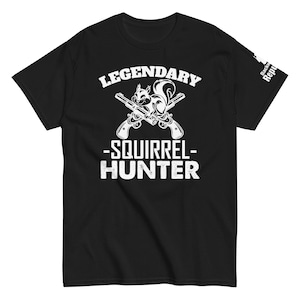 May include: Black t-shirt with white text that reads "Legendary -Squirrel- Hunter". A cartoon squirrel holding two crossed rifles is above the text.