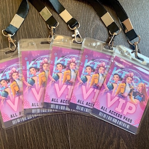 May include: Five VIP All Access Pass badges with black lanyards. The badges have a pink and purple design with animated character illustrations. The text "VIP" and "ALL ACCESS PASS" are displayed on the front.