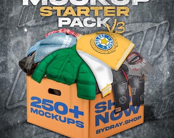 May include: An orange cardboard box overflowing with clothing items, including a green puffer jacket and a yellow baseball cap with a badge. The box has the text "250+ MOCKUPS" and "SHOP NOW". The image also includes the text "MOCKUP STARTER PACK".