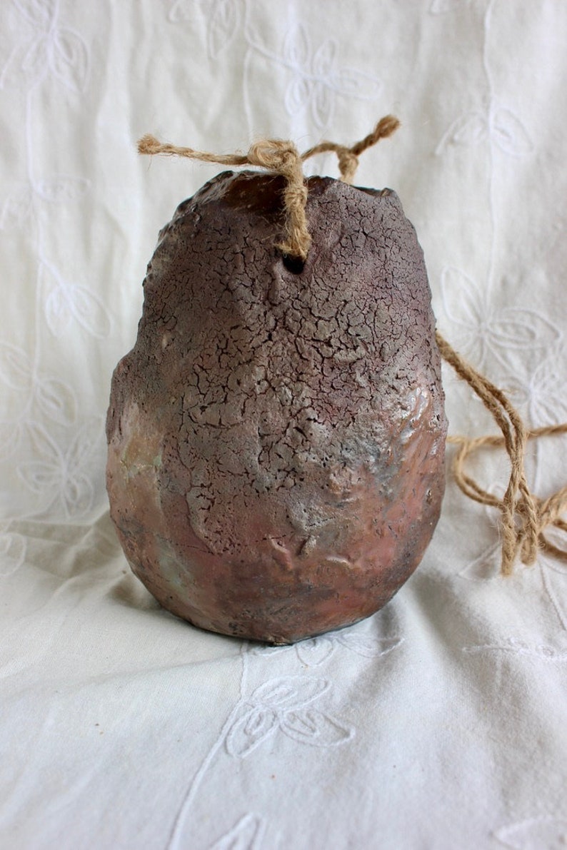 Outdoor decor, bird’s nest, candleholder, pottery, handmade, stoneware, Raku, iridescent blues, golds, greens, reds, 6"h x 4 1/2” w x 2 1/2" bild 3