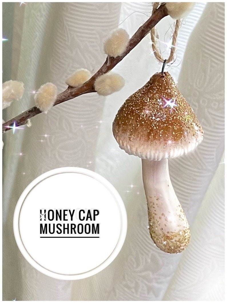 Honey brown mushroom ornament with sparkly top, conical, hanging from pussy willow branch