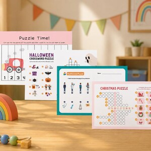 Può includere: Una raccolta di quattro fogli di attività educative che includono Puzzle Time con un treno, un cruciverba di Halloween, un gioco di abbinamento delle professioni e un puzzle natalizio con griglie di ricerca parole, stampati su carta bianca.