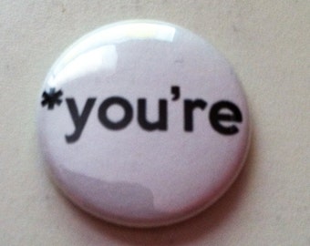 you're - spell it properly -  Button or Magnet 1 or 1.5 inch