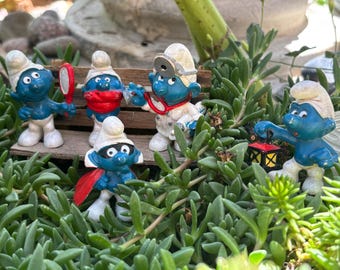 Set von fünf Vintage Schlumpf Spielzeug Figuren (1960s-1980s)