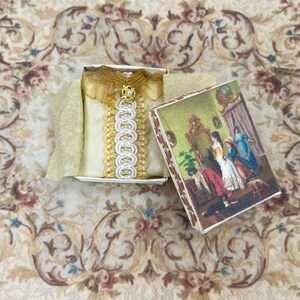 Dollhouse Miniature lady victorian blouse in its box. 1:12 Dollhouse Miniature home & doll complements items for dollhouse collectors.