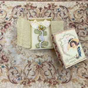 Dollhouse Miniature lady victorian blouse in its box. 1:12 Dollhouse Miniature home & doll complements items for dollhouse collectors.
